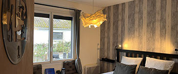 Chambre 1 Chez Flo & Marc avec vue sur le Jardin